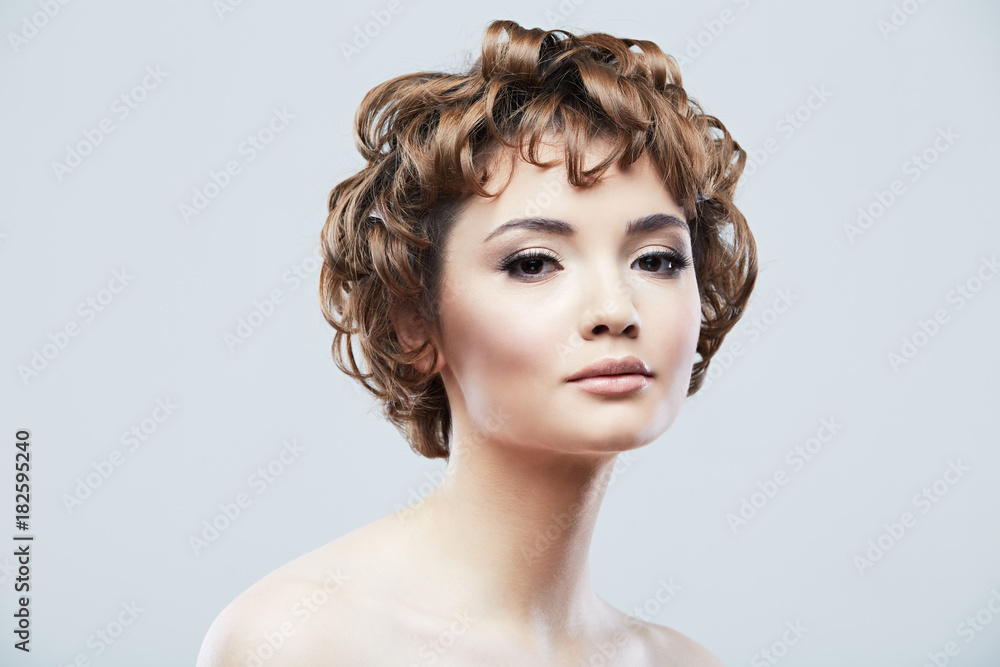 Young woman close up face beauty portrait on white background. Young woman close up face beauty portrait on white background.