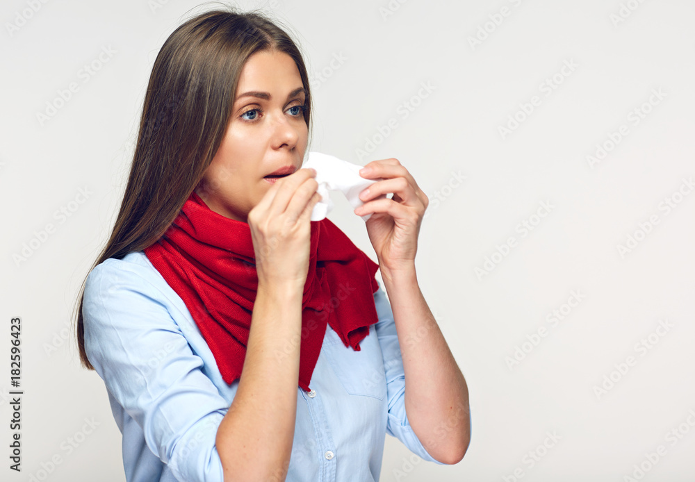 Sick flu woman with red scarf using paper tissue. Sick flu woman with red scarf using paper tissue.