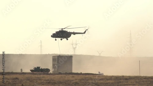 Marines disembark from a helicopter