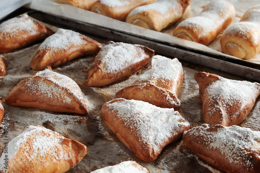 Fresh tasty bakery products on tray Fresh tasty bakery products on tray