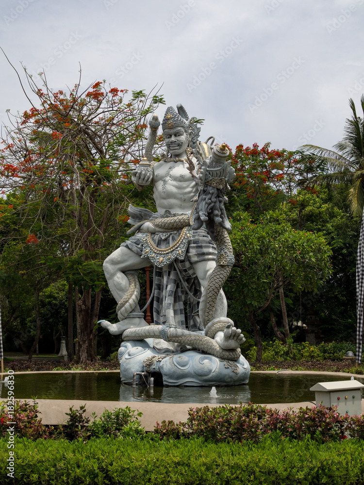 Fototapeta premium Closeup of traditional Balinese statue in Central Bali temple. Indonesia, autumn, 2017