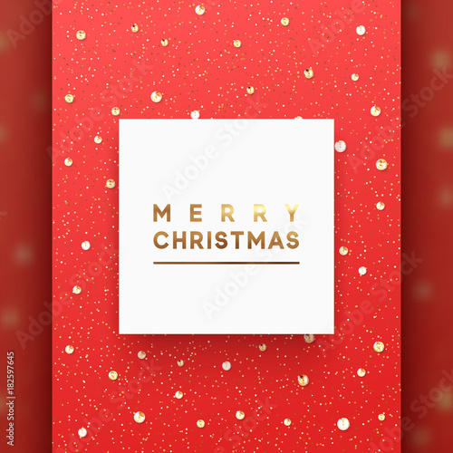 Christmas background is strewn with precious stones and bright sparkles. Merry Christmas lettering in square white frame, luxury text of gold color.