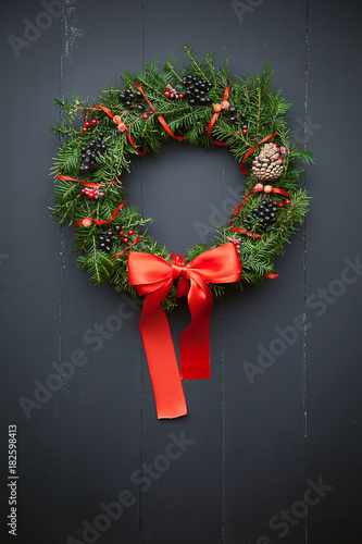Christmas wreath on a wooden background