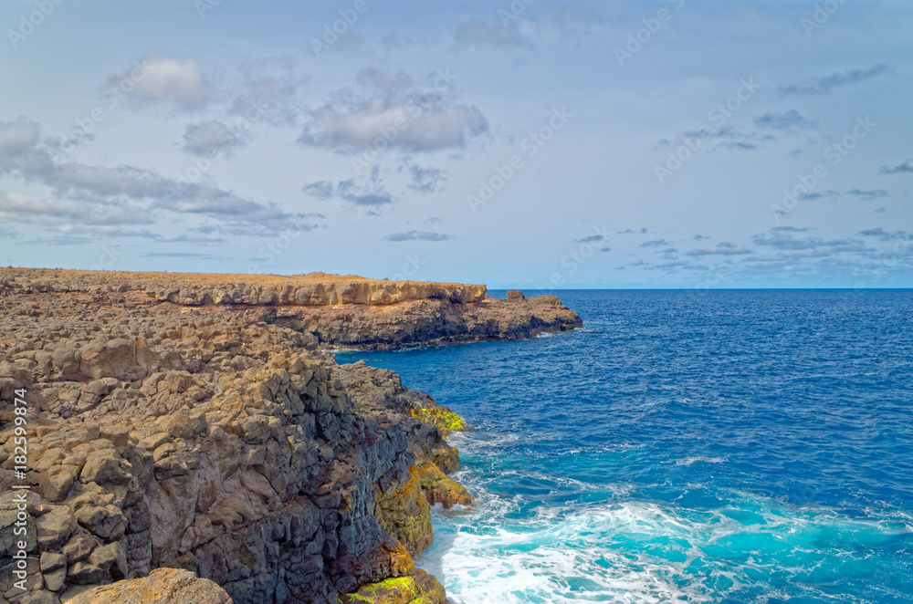 Rocky coastline, cliffs on the island Sal, Cape Verde
