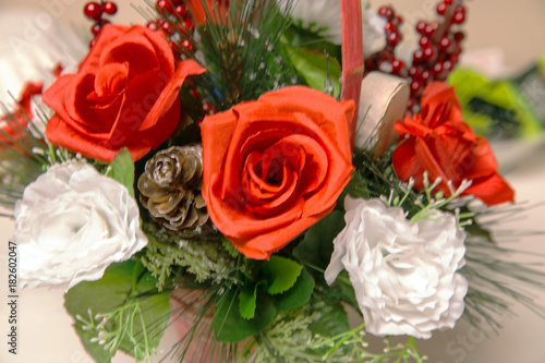 blurred abstract silk roses red and white Christmas holiday season background