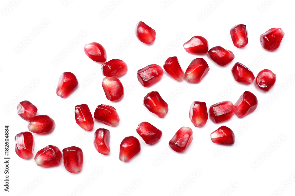 pomegranate seeds isolated on white background. top view. pomegranate berries. pomegranate seeds isolated on white background. top view. pomegranate berries.