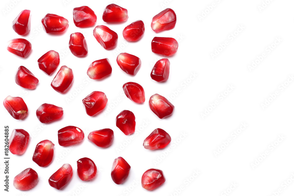 pomegranate seeds isolated on white background. top view. pomegranate berries.