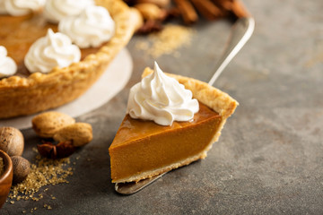 Pumpkin pie with whipped cream