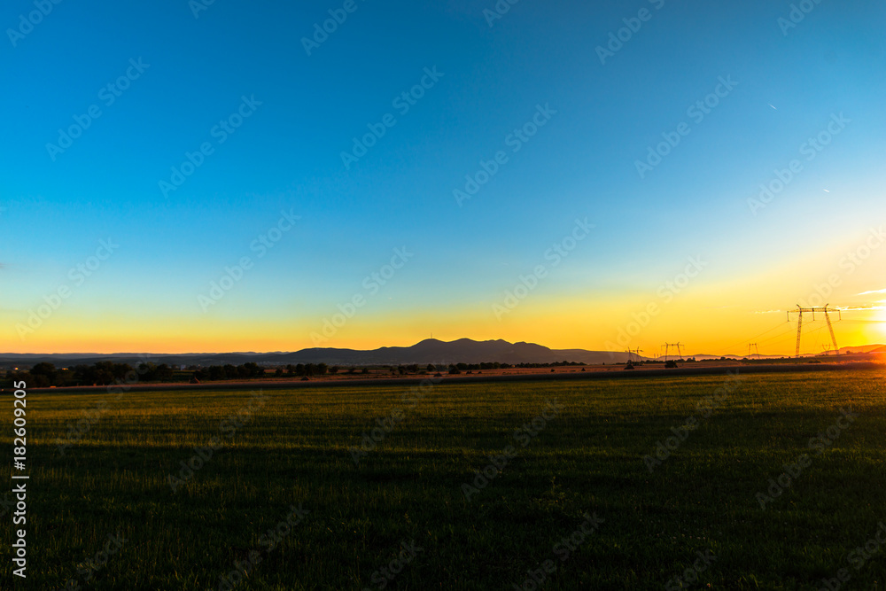 Obraz premium Electric pylon at sunset