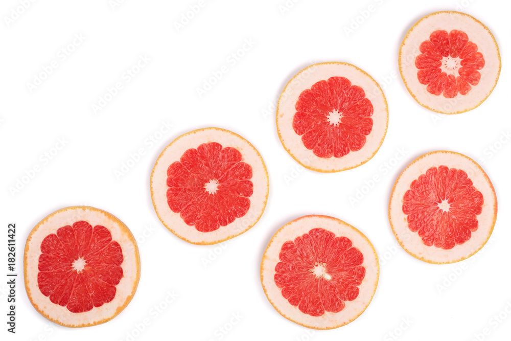 Grapefruit slices isolated on white background with copy space for your text. Top view. Flat lay pattern Grapefruit slices isolated on white background with copy space for your text. Top view. Flat lay pattern