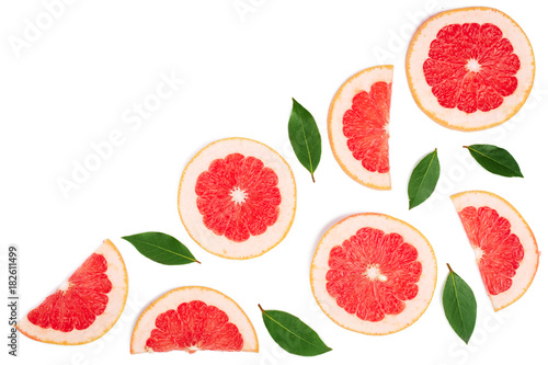Grapefruit slices with leaves isolated on white background with copy space for your text. Top view. Flat lay pattern