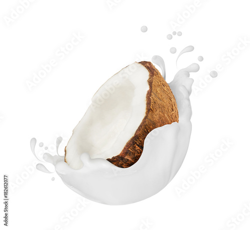 Coconut with milk splashes close-up, isolated on white background