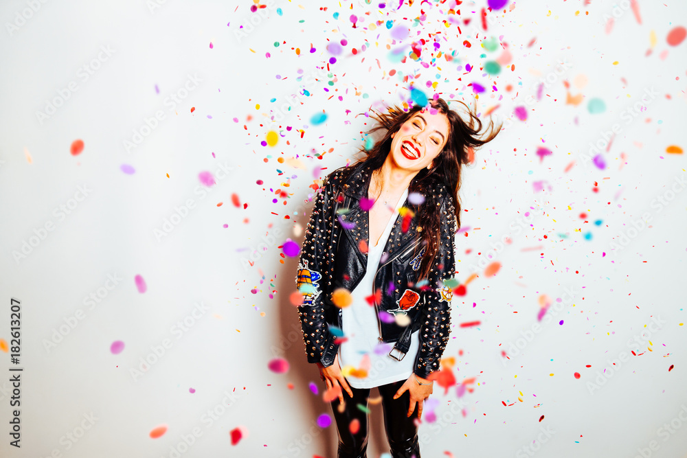Happy party woman with confetti Happy party woman with confetti