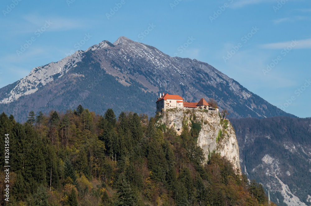 The picturesque Bled castle with the majestic Alps in the background