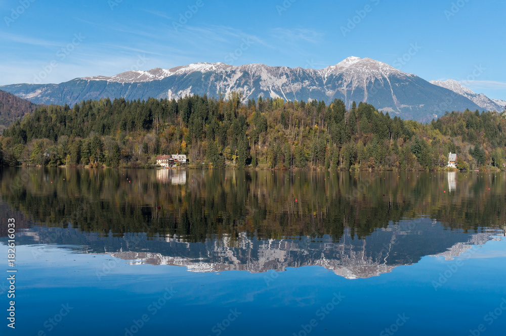 The beautiful Slovenian Alps reflecting into the pure waters of lake Bled