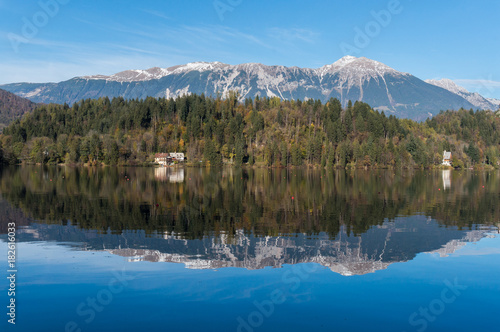 The beautiful Slovenian Alps reflecting into the pure waters of lake Bled