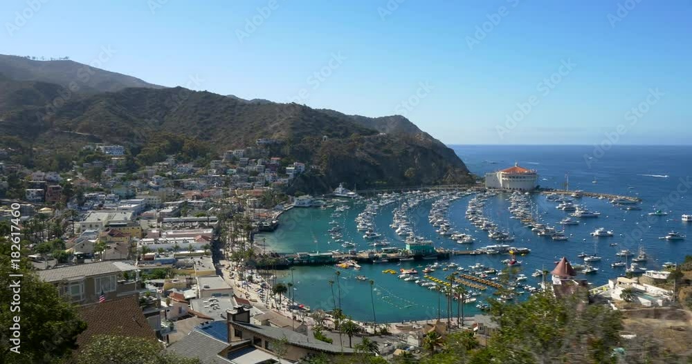 Looking down at the bay and town of Avalon on Catalina Island. Boat fill the harbor. Looking down at the bay and town of Avalon on Catalina Island. Boat fill the harbor.