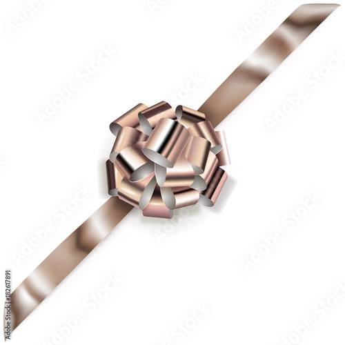 Beautiful big corner bow made of bronze shiny ribbon with shadow on white background