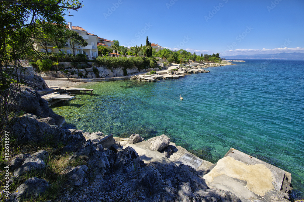 The rocky Adriatic coastline in Porat village. The island of Krk, Croatia