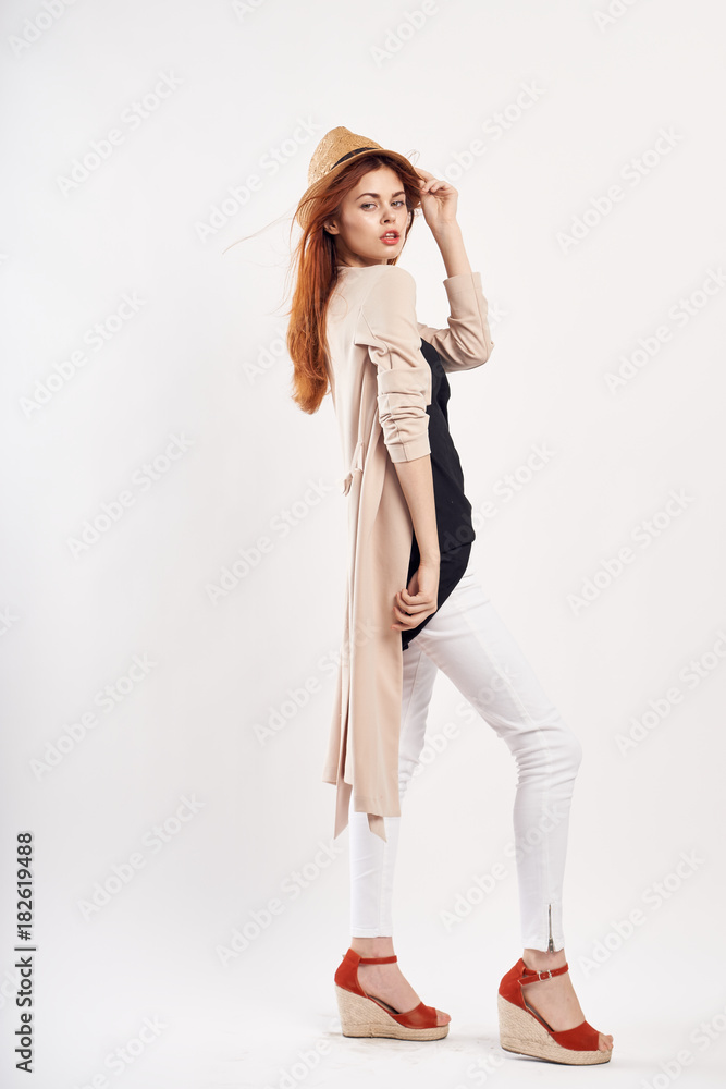 beautiful red-haired girl posing in cream cardigan beautiful red-haired girl posing in cream cardigan