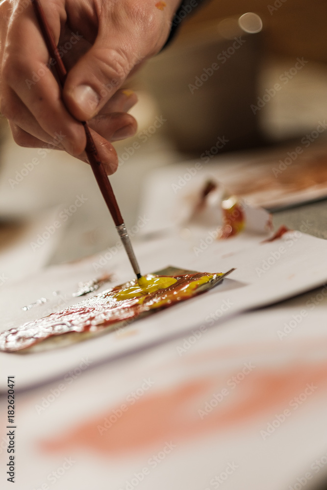 Obraz premium Paint Brush with Hand