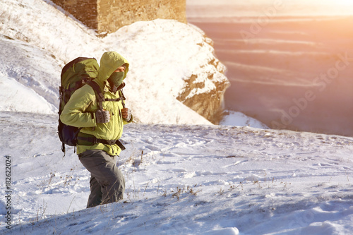 Climber in a snow storm photo