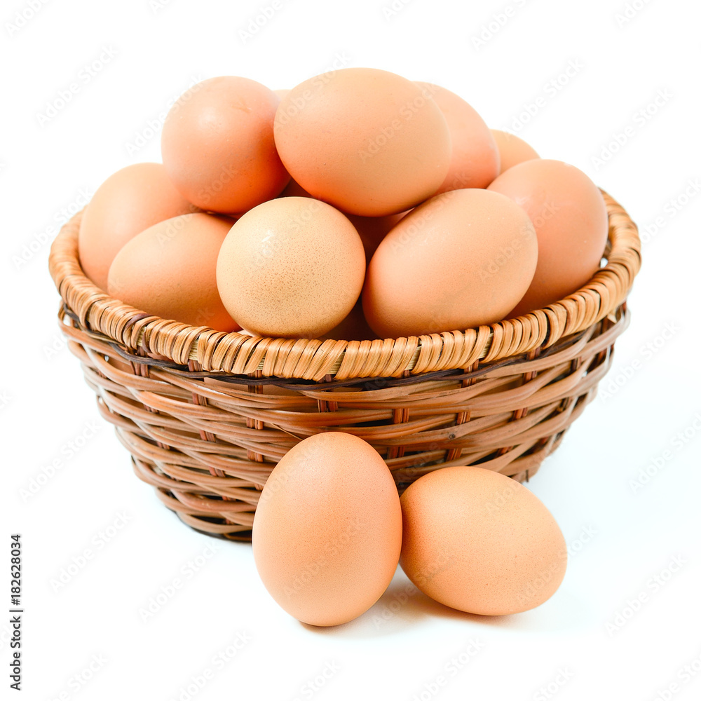 Eggs in basket isolated on white background Eggs in basket isolated on white background
