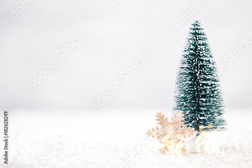 Christmas tree and gray background.