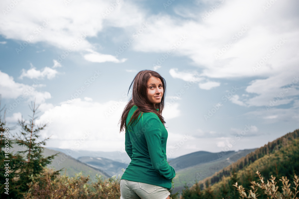 Outdoor close up portrait stylish hipster girl behind amazing mountains landscapes,girl in sportswear, sexy model, girl hiking Outdoor close up portrait stylish hipster girl behind amazing mountains landscapes,girl in sportswear, sexy model, girl hiking