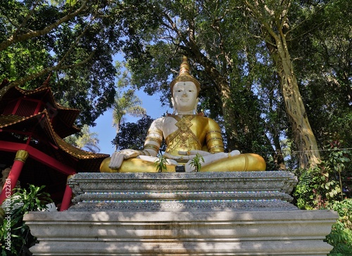 Golden buddha sitting temple Chiang Mai Thailand