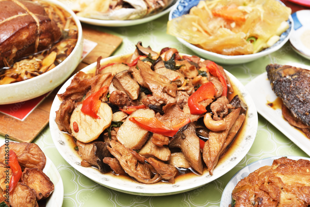 Fried abalone mushroom with wine,sesame oil and soy sauce, a popular chinese dish Fried abalone mushroom with wine,sesame oil and soy sauce, a popular chinese dish
