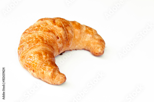 freshly baked croissants on white background, top view