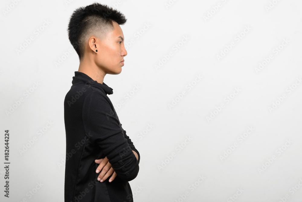 Profile view of Asian girl with tomboy style Profile view of Asian girl with tomboy style