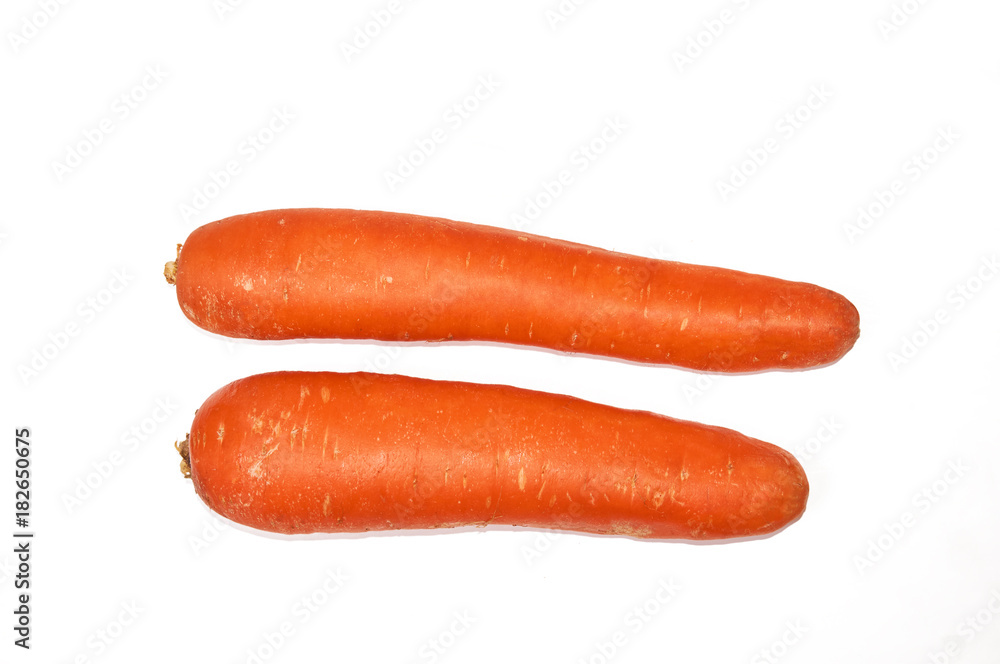 Two whole carrots isolated on a white background. Isolate. Food background. Two whole carrots isolated on a white background. Isolate. Food background.