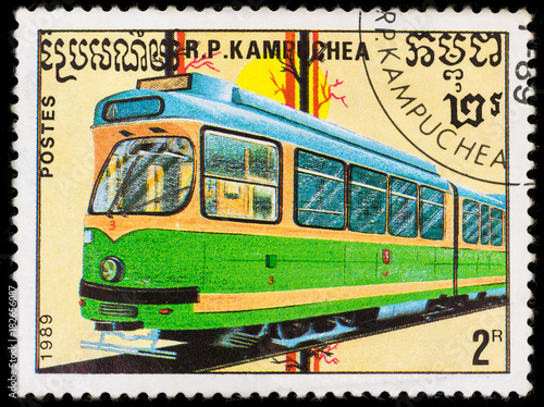 Old postage stamp shows highspeed locomotive and railway, printed in Kampuchea in 1989