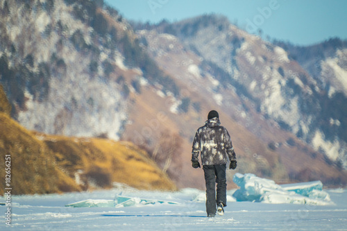 Man hiking in mountains. Landscape. Siberia.