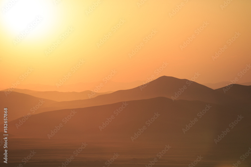 Mountains and prairies under the sun