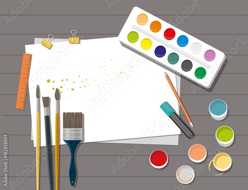 Workplace. Paints, brushes, pencils, pen, paper. Back to school. Hobby. 