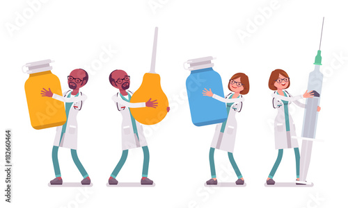 Male and female doctor with giant tools