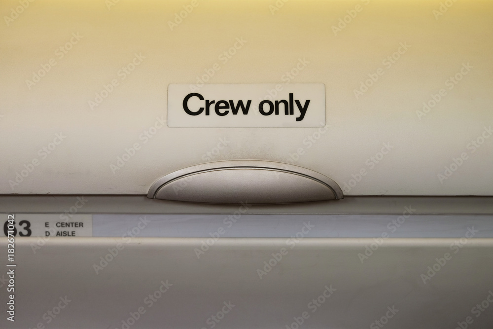 Overhead locker for crew only in the airplane