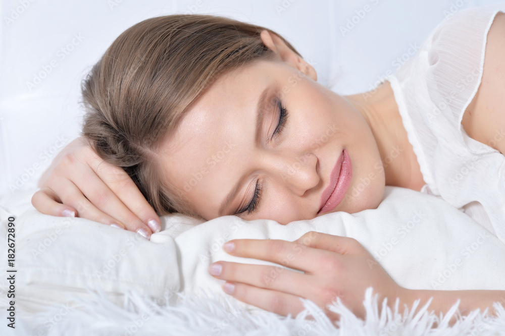 Young woman sleeping in bad Young woman sleeping in bad