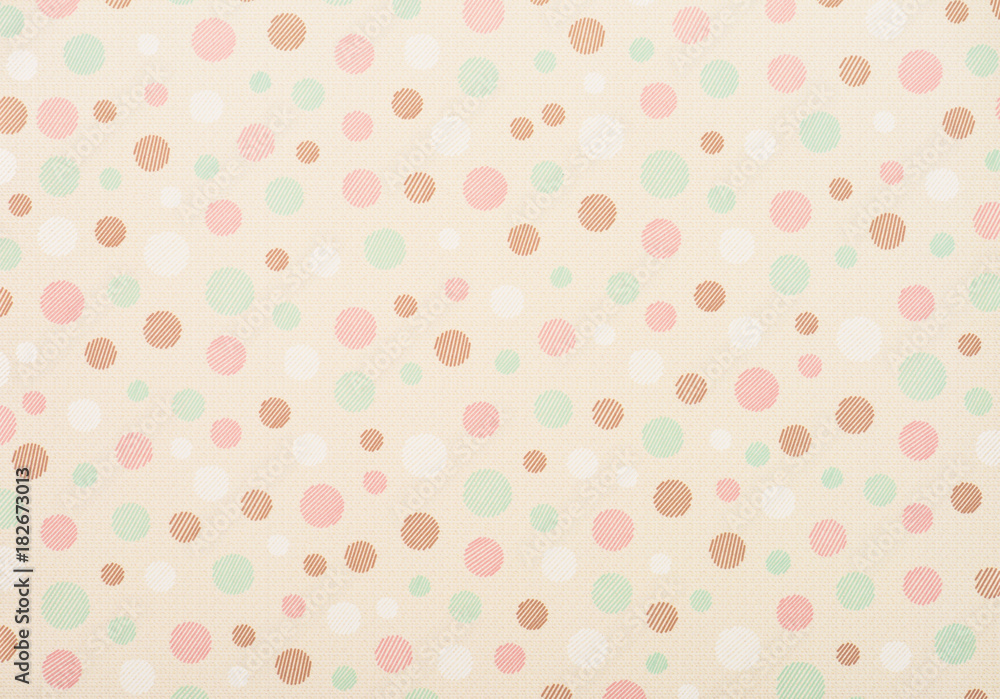 set of different sized colored circles on beige