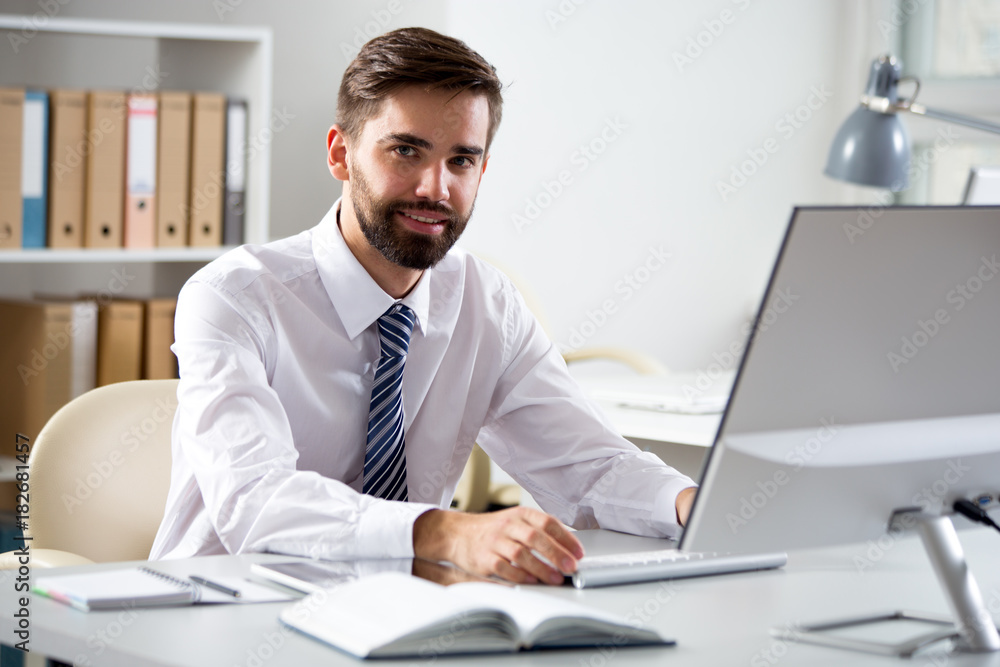 Businessman working in an office Businessman working in an office