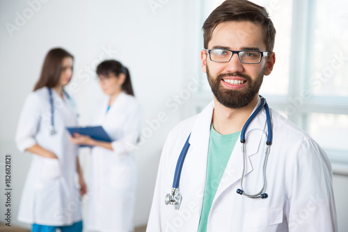 Portrait of a young doctor in a clinic