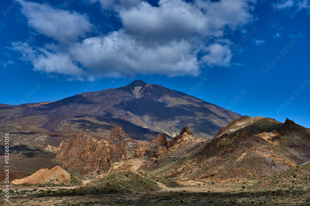 Volcano Teide and lava scenery in Teide National Park, Rocky volcanic landscape of the caldera of Teide national park in Tenerife, Canary Islands, Spain Volcano Teide and lava scenery in Teide National Park, Rocky volcanic landscape of the caldera of Teide national park in Tenerife, Canary Islands, Spain
