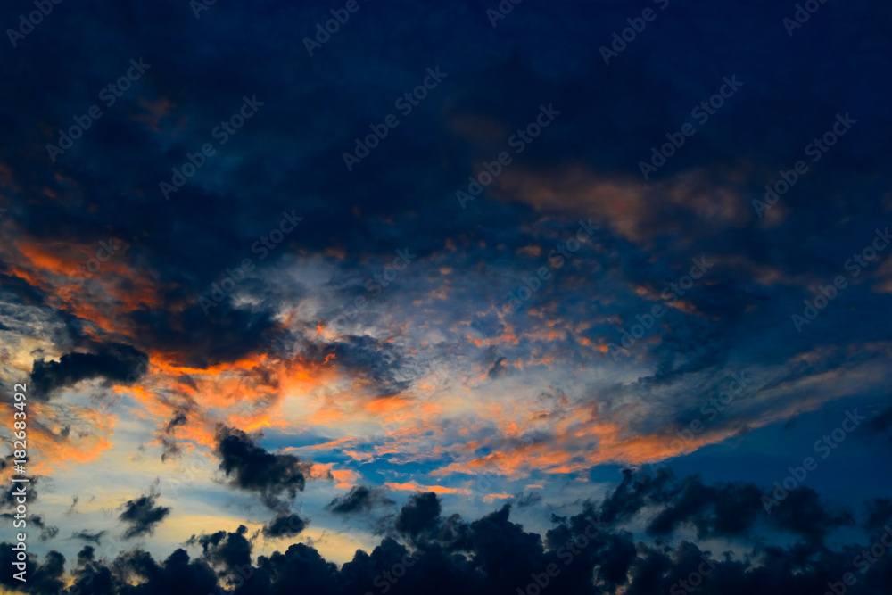 Naklejka premium Sunset in clouds