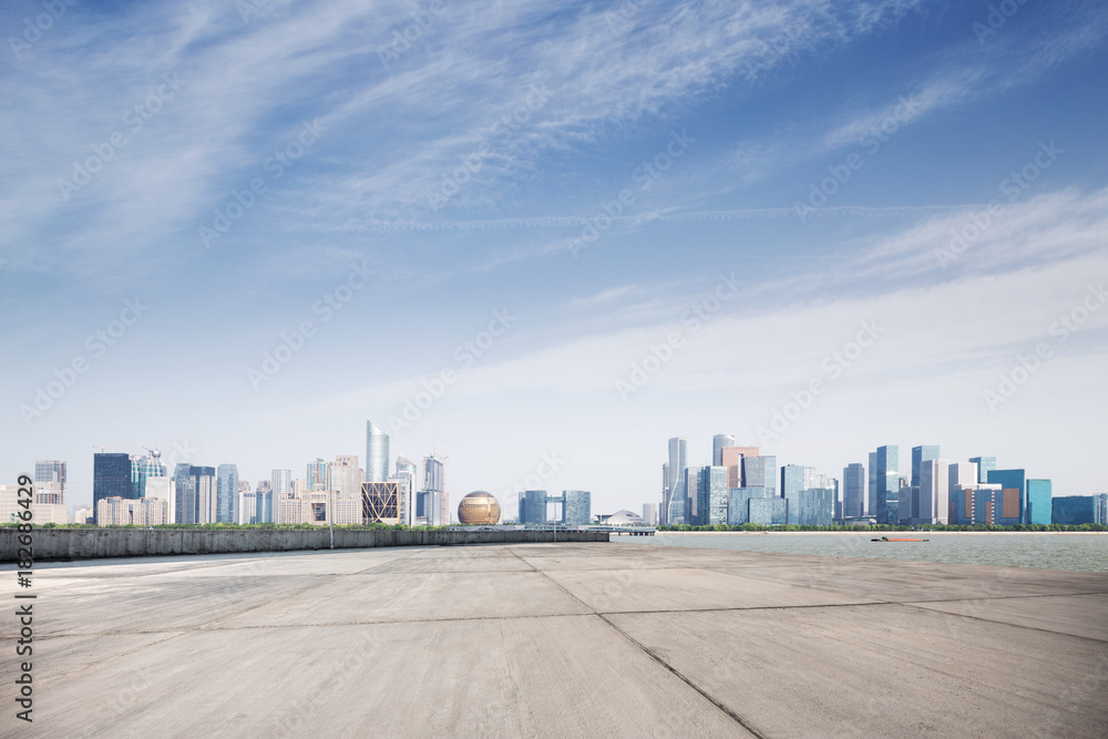 empty concrete floor with modern cityscape empty concrete floor with modern cityscape