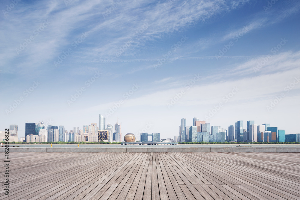 empty wooden floor with modern cityscape empty wooden floor with modern cityscape