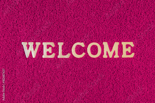 Plastic doormat and welcome word