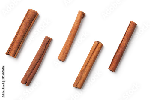 Print op canvas Cinnamon Sticks Isolated on White Background